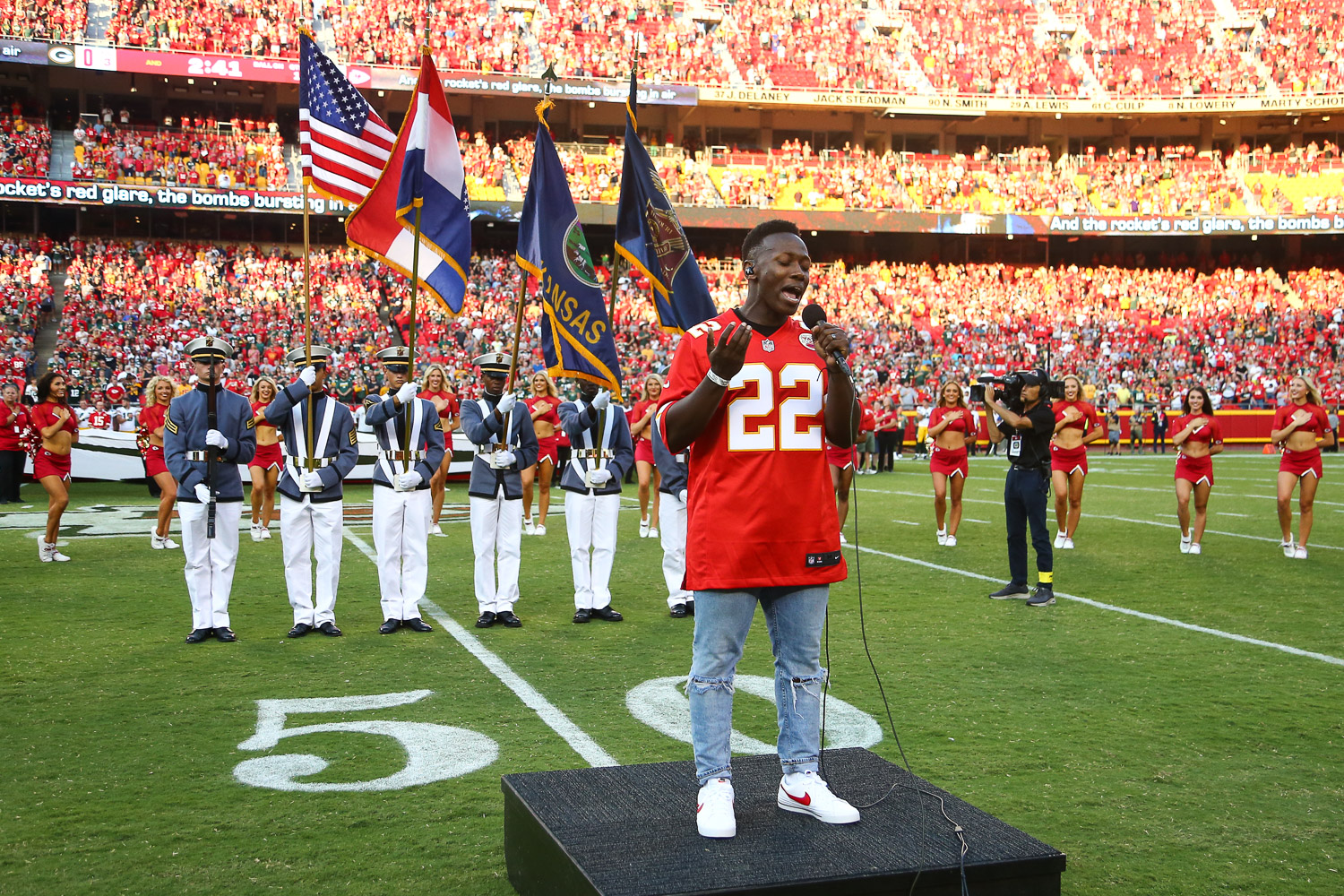 Nashville recording artist Brian Nhira singing the National Anthem prior to an NFL preseason football game against the Green Bay Packers, Thursday, August 25, 2022 in Kansas City.
