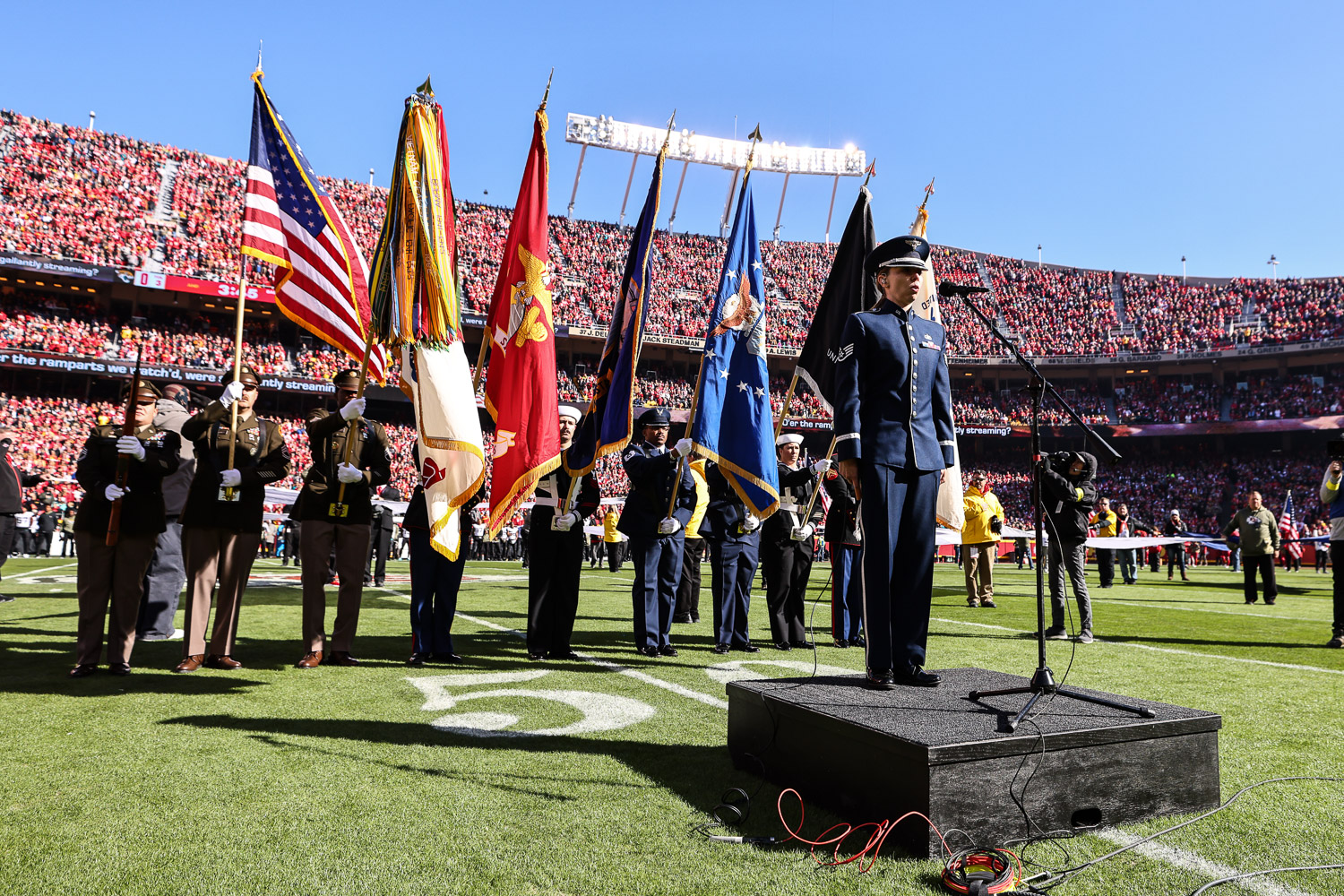 United States Air Force Staff Sergeant Melissa Griffith sings the national anthem prior to an NFL football game against the Jacksonville Jaguars, Sunday, November 13, 2022 in Kansas City.