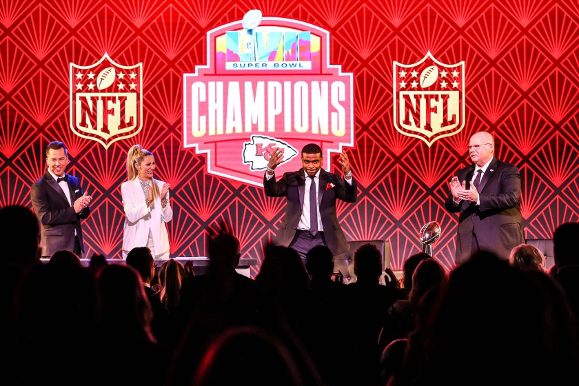 James Palmer and Laura Rutledge with Kansas City Chiefs running back Jerick McKinnon and Head Coach Andy Reid during the 53rd annual 101 Awards at The Westin Crown Center in Kansas City, Missouri on Saturday, February 25, 2023.