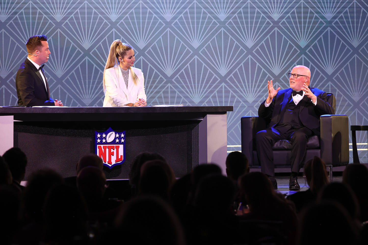 James Palmer and Laura Rutledge with Mike Madden who is receiving the Lamar Hunt Award for Professional Football for his late father John Madden during the 53rd annual 101 Awards at The Westin Crown Center in Kansas City, Missouri on Saturday, February 25, 2023.